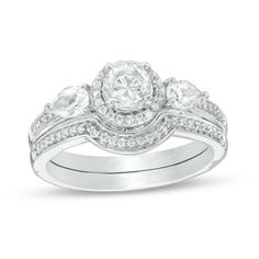 a white gold ring with diamonds on it