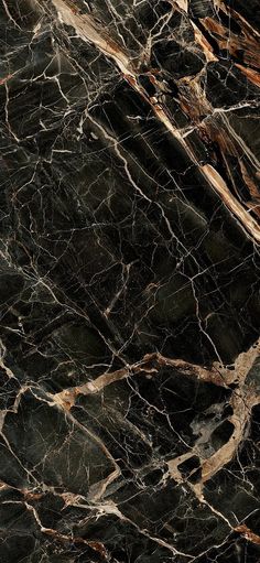 black marble textured with gold veining and dark brown streaks on the top right side