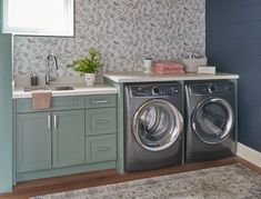 a washer and dryer in a small room