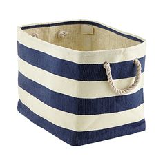 a blue and white striped storage bin with rope handles on the bottom, one side open