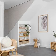 a living room filled with furniture and decor