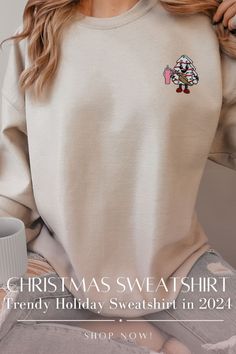 This sweatshirt effortlessly blends nostalgia with contemporary fashion, making it a standout piece for your holiday wardrobe. The charming Little Debbie Christmas Tree Cake design, intricately embroidered on a cozy fabric, brings a playful yet sophisticated touch to your festive attire.

Whether you’re lounging by the fire, heading to a holiday gathering, or just running errands, this sweatshirt offers the perfect mix of comfort and style. It’s a conversation starter, a cozy layer, and a fashion statement all in one. Embrace the holiday spirit and make this iconic sweatshirt your go-to for Christmas 2024. Tree Cake Design, Little Debbie Christmas Tree, Festive Attire, Little Debbie, Tree Cake, Christmas Tree Cake