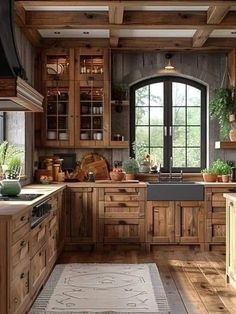 a kitchen filled with lots of wooden cabinets and counter top space next to a window