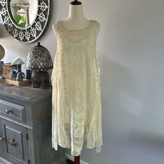 Stunning Cream Colored Embroidered Lace Swing Dress. This Has Been Sitting In My Closet For Years And Never Worn. The Slip Is Detachable So You Could Wear Anything Underneath It. The Price Tag Is $795 But I Paid Half That For It. The Sides Of The Dress Are My Favorite Part. Bust Length Bundle And Save 20% Embroidered Sleeveless Dress For Daywear, Sleeveless Embroidered Dresses For Daywear, Sleeveless Embroidered Midi Dress For Wedding, Sleeveless Midi Dress With Floral Embroidery For Daywear, Sleeveless Floral Embroidery Midi Dress For Daywear, Embroidered Lace Flowy Dress, Sleeveless Embroidered Silk Dress, Flowy Sleeveless Lace Midi Dress, Flowy Lace Sleeveless Midi Dress