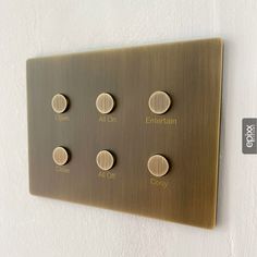 a light switch with four different knobs on it