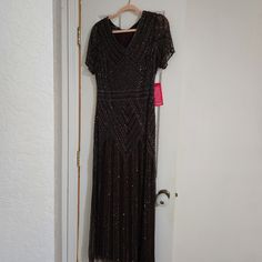 Beautiful Never Worn Beaded Plum Gown. It Is A Size 16 But Runs Small, More Of A 12/14. I'm Nearly 5 Feet, And It Drags When I Put It On. It's A Beautiful Dress! Beaded Floor-length Dress For Night Out, Beaded Floor-length Cocktail Dress, Holiday Beaded Evening Dress, Purple Beaded Dress, Plum Gown, Pisarro Nights, Dresses Purple, Beaded Dress, Purple Dress