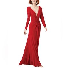 a woman in a long red dress posing for the camera with her hands on her hips