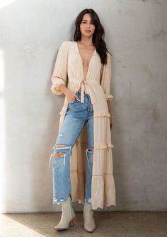 A showstopping kimono top full of endless details and so many different ways to wear. With a flirty ruffle trim and adjustable tie front, be ready to make a statement. Therapist Outfit, Small Business Boutique, Business Boutique, Maxi Kimono, Embroidered Kimono, Boho Kimono, Knit Sweater Cardigan, Long Sleeve Cardigan, Kimonos