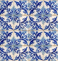 blue and white tiles with an intricate design