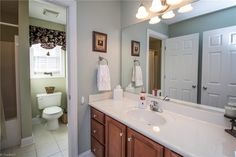 the bathroom is clean and ready to be used as a family room or office space