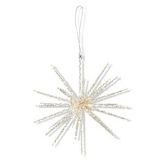 a white star ornament hanging from a string