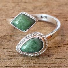 Natural Guatemalan jade shines in this pretty wrap ring from Victoria Zurdo. A diamond cabochon of the stone is set in a plain bezel while a pear-shaped gem is set in a rope-edged bezel. The sterling silver ring is polished to a high shine. Adjustable Pear-shaped Jewelry For Anniversary, Adjustable Pear-shaped Ring For Gift, Adjustable Green Teardrop Ring, Modernist Ring, Odds And Ends, Wrap Ring, Wrap Rings, Piercing Jewelry, Jewelry Trends