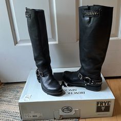 Frye Leather Biker Boots In Black. Tall. Chain Detail Around Heal And At Top Of Boot, On Side. Great Condition. Cute With Leggings. Or Short Skirt. Very Comfortable. Size 8 But Runs Large (8.5 Can Wear). Combat Boots Shorts, Leather Biker Boots, Biker Boots, Frye Shoes, Moto Boots, Short Skirt, Combat Boots, Leggings, Women Shoes