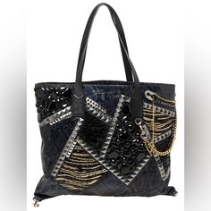 Marc Jacobs Blue/Black Python Embossed Leather Embellished Wingman Tote Crafted From Python-Embossed Leather, The Exterior Is Embellished With Studs, Chains, And Sequins For A Rock-Chic Vibe. The Interior Is Spacious That Makes It A Fashion-Meets-Function Accessory And Includes A Small Zippered Bag That Can Detach. Exterior: Python Embossed Leather; Hardware: Silver Tones Length 46 Cm; Width 2 Cm; Height 39 Cm; Handle Drop 23 Cm. Like New Condition No Dust Bag. Bags Marc Jacobs, Black Python, Zippered Bag, Rock Chic, Marc Jacobs Bag, Python, Emboss, Embossed Leather, Marc Jacobs