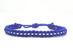 Fashionable and durable hand-made blue bracelet with a white line, adjustable to fit wrist sizes from 6 to 9 inches, Made from high quality string, it will be sure to last.Each bracelet is carefully handcrafted and give proper time to ensure quality.Fast & Free shipping Blue Adjustable Braided Bracelet For Gift, Everyday Resizable Blue Braided Bracelets, Blue Adjustable Braided Bracelet, Adjustable Woven Blue Bracelets, Adjustable Blue Hand-strung Braided Bracelets, Amulet Bracelet, Good Luck Bracelet, Red String Bracelet, Protection Amulet