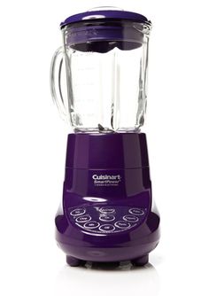 a purple blender sitting on top of a white table