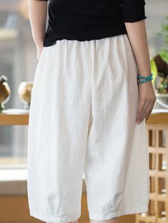 White Cotton Harem Pants With Pockets, Summer Linen Harem Pants With Side Pockets, Baggy Linen Bottoms For Summer, Summer Baggy Linen Bottoms, White Linen Ankle-length Bottoms, Cotton Short Pants For Spring, White Cotton Relaxed Fit Harem Pants, Spring Cotton Short Pants, Spring Short Cotton Pants