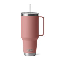 the yeti travel mug is shown in pink