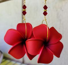 "Eye Catching Flower Earrings, Floral Earrings, Tropical Flower, Hawaii Flower, Flower Jewelry, Hawaiian Jewelry, Hawaii Jewelry, Wedding Jewelry, Bridesmaid Jewelry, Bridal Jewelry by U'i Jewelry Moani (Moe ah nee) * Fragrant Breeze You'll turn any look into a statement with these exotic, eye catching earrings. I created them using feather weight foam plumeria / frangipani flowers that look and feel almost like a real flower. The flower petals have an amazing shades of dark red, very vibrant an Red Flower Earrings For Anniversary, Red Wedding Earrings, Red Flower Earrings For Wedding, Red Flower Drop Earrings For Wedding, Red Wedding Earrings With Ear Wire, Red Ear Wire Earrings For Wedding, Handmade Red Bridal Earrings For Wedding, Elegant Handmade Red Flower Earrings, Red Handmade Flower Earrings