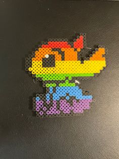 a piece of art made out of perler beads