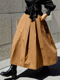 High Waist Brown Maxi Skirt For Fall, High Waist Khaki Skirt For Spring, Brown Midi Skirt For Spring, Relaxed Khaki Skirt For Fall, Spring Brown Cotton Maxi Skirt, Brown Cotton Maxi Skirt For Spring, Cotton Brown Maxi Skirt For Spring, Brown Skirt For Spring, Brown Spring Skirt