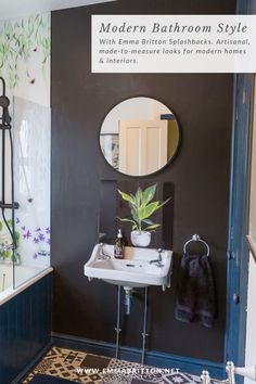 the bathroom is decorated in black and white