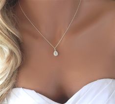 What better way to say "thank you" to your bridesmaids than to gift them with this gorgeous teardrop cz necklace. Perfect for not just the big day but year round. - Made with 14k gold filled, rose gold filled or sterling silver chain and components- A high quality delicate link chain- The CZ teardrop stone is gold, rose gold or silver plated (nickel and lead free)- Necklace is shown at 17"- Handmade Diamond Wedding Necklace, Necklace For Bride, Crystal Wedding Necklace, Diamond Necklace Wedding, Bride Elegant, Prom Necklaces, Bridesmaid Thank You, Diamond Necklace Designs, Cz Necklace