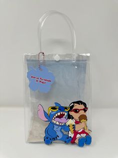 Disney Style Gift Bag, Rectangular Shape, Blue Disney Bags For Gifts, Themed Rectangular Bag For Gifts, Themed Rectangular Gift Bag, Themed Rectangular Bag As A Gift, Themed Blue Bags For Gifts, Blue Novelty Bags For Gifts, Novelty Blue Bags For Gifts, Lilo Stitch Party