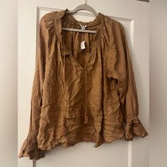 Boho Style Top, Peplum Kind Of At The Bottom, Ruffles On The End Of The Sleeve, Tan Color, Size Xl, Sorry About The Wrinkles!! New With Tags Peasant Style Brown Long Sleeve Tops, Boho Style Tops, Tan Color, Boho Style, Wrinkles, Boho Fashion, American Eagle Outfitters, Ruffles, The End