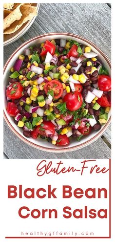 a white bowl filled with black bean corn salsa