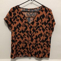 Cheetah Print Top - Medium Never Worn. Cute V-Neck With Bar Design. Flowy Fit. Looks Cute For Curvy Types! [Clear Bin] Trendy Leopard Print V-neck Top, Brown V-neck Blouse For Day Out, Trendy Leopard Print V-neck Blouse, Brown Tiger Print Top For Spring, Brown Tiger Print Tops For Spring, Spring Brown Tiger Print Tops, Cheetah Print Top, Clear Bins, Shein Tops