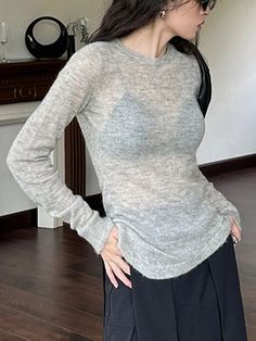 This is perfect for those who are looking for a clothing for a good price. It is fashionable, stylish, and it will look great on anyone who wears it. Do you wanahavit? Casual Asymmetrical Sweater, Casual Solid Asymmetrical Sweater, Trendy Asymmetrical Sweater For Winter, Trendy Gray Knit Top With Crew Neck, Trendy Gray Crew Neck Knit Top, Chic Soft Knit Gray Tops, Chic Gray Long Sleeve Knit Top, Gray Long Sleeve Knit Top For Layering, Casual Asymmetrical Knit Top For Winter