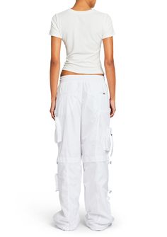 Baggy silhouette track pants with 3D side panel pockets, metal and zipper aglet embellishments. Double back welt pockets, and an adjustable ruched gathered drawstring hem. Shown here in White. 100% Polyester Made in China Model is 5'10" wearing size S Style No. 2755-14 Australia Clothes, Cargo Pant, China Fashion, Corset Top, Denim Pant, Track Pants, Welt Pockets, Welt Pocket, Panel Siding