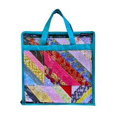 a blue bag with many different fabrics on it