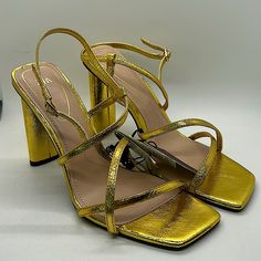 Nwt Never Worn, Dazzling Gold Zara Strappy High Heels. Eu Size 40 = Usa Size 9. - Heel Height: 4-1/2”. - Made With Airfit Extra Comfort Technical Insole Foam That Provides Breathable, Antibacterial, Cushion Factors. - These Are So Sexy! Beautiful, Rich Gold Tone That Will Definitely Draw Attention! Don’t Miss Out! **Comes From A Clean, Smoke Free Home** Trendy Gold Block Heel Shoes, Gold Strappy Heels For Evening, Gold Open Heel Heels For Party Season, Glamorous Strappy Heels For Date Night, Gold Sandals With Padded Heel For Date Night, Gold Heels With Heel Strap For Party Season, Trendy Gold High Heels, Gold Strappy Heels With Heel Strap, Gold Heels With Padded Heel For Night Out