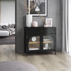 a living room scene with focus on the sideboard