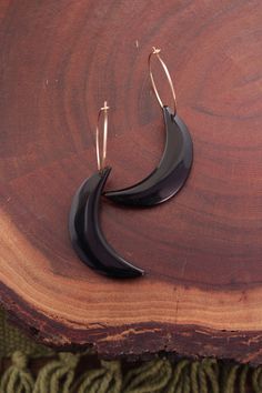 Carved obsidian crescent moons hanging from simple sterling silver or gold filled hoops. Gorgeous unique statement earrings! // size // - earrings measure 2.25 inches long, hoops are about 20mm Black Crescent Moon Charm Earrings, Handmade Black Crescent Earrings, Minimalist Crescent Hoop Earrings With Ear Wire, Black Drop Earrings With Moon Charm, Nickel-free Black Crescent Jewelry, Black Crescent Nickel-free Jewelry, Nickel-free Black Crescent Earrings, Minimalist Crescent Hoop Earrings With Moon Charm, Crescent Moon Earrings