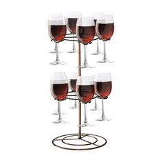 six wine glasses are arranged on a stand