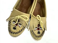 Cute moccasins - beaded thunderbird on the front.  Good shape! Older - made in the USA Size 4 - XS - kids! sole ~9" ball ~3 1/8" Moccasins Beaded, Beaded Thunderbird, Fringe Shoes, Shoes Size 4, Minnetonka Moccasins, Vintage Leather, Moccasins, Festival Season, Made In Usa