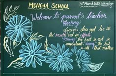 a chalk board with flowers painted on it