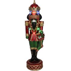 a christmas nutcracker with lights on it's head and arms, standing upright