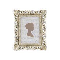 a gold frame with a silhouette of a woman