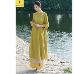 Vietnamese traditional Ao Dai, green dress, Ao Dai embroidered flowers,for Women, Girls/teen New year party ao dai. Set includes: a Traditional ao dai + a pants + Material: Branches and leaves are embroidered directly on soft silk fabric, creating a luxurious feeling. The pattern is embroidered on many color tones to help you freely choose according to your preferences.   The shirt and pants are both selected with grade 1 fabric and sewn carefully and meticulously.   The sample received is the s Green Long Kurta For Spring, Summer Embroidered Ao Dai, Green Long Sleeve Kurta For Spring, Green Spring Festive Kurta, Green Spring Wedding Cheongsam, Spring Wedding Green Cheongsam, Green Embroidered Long Sleeve Dress For Eid, Elegant Green Kurta For Spring, Green Long Sleeve Embroidered Dress For Eid