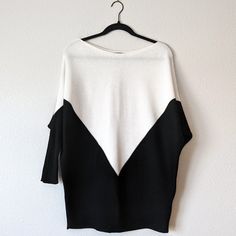 Details Size Medium Colors Black / White Soft Rib Knit Dolman Sleeves Bateau Neckline Care And Fabric Tags Removed Excellent Pre-Owned Condition, No Known Flaws Measurements Bust 30" Hem 18" Measured Flat New To Poshmark? Sign Up Using The Referral Code Petitsluxes To Save $10! 20% Off When You Bundle 2 Or More Items + Only One Shipping Fee! Offers Welcome! Information Nwt Or Dry-Clean Only Garments Are Steamed & Deoderized Pre-Owned Garments Are Laundered Per Care Instructions Photos Are Part Of The Description, Please View Entire Gallery Different Lighting Affects Appearance Of Items All Measurements Are Approximate Same Or Next-Day Shipping Black Knit Sweater With Batwing Sleeves, Black Batwing Sleeve Sweater For Spring, White Batwing Sleeve Top For Winter, Chic White Batwing Sleeve Sweater, Chic Knit Top With Batwing Sleeves, Chic Black Sweater With Batwing Sleeves, Casual White Batwing Sleeve Sweater, Chic Black Batwing Sleeve Sweater, Oversized White Sweater With Batwing Sleeves