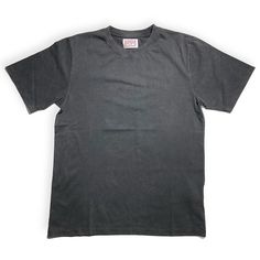 a black t - shirt on a white background