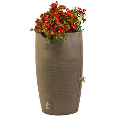 a planter with red flowers in it on a white background