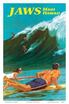 a man laying on top of a surfboard next to another man riding a wave