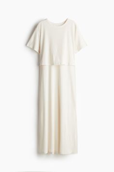 Loose-fit  calf-length nursing dress in soft  ribbed jersey. Round neckline  short sleeves  and a unique nursing feature – double layers at top help retain warmth while allowing easier nursing access. White Nurse Dress, Postpartum Wardrobe, Bump Outfits, Nursing Dress Breastfeeding, Nursing Gown, Maternity Outfits, Cardigan Sweater Dress, Suits And Jackets, Blouse Pants