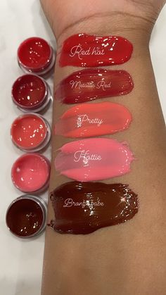 🍎 Red Hot (all glosses are unscented) 💕 Pretty 🥵 Hottie 🍎 Metallic Red 🤎 Bronze Babe 👄Lip gloss size: 4 oz. (4 oz) fills roughly 10-11 10ml tubes We created the perfect Fall and Holiday shades just for you.  All of these were made with you in mind.  These are all fragrance free. Warning, these are highly pigmented just like the pictures.  Samples are now available on our sample list so you can try before you buy if you like!  These will create the perfect Holiday bundle for your business. Lip Gloss Red, Boho Makeup, Fall Lips, Lip Gloss Homemade, Red Lip Gloss, Lip Gloss Shades, Lip Gloss Cosmetics, Lip Gloss Balm, Best Lip Gloss