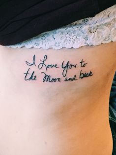 a woman with a tattoo on her stomach saying i love you to the moon and back